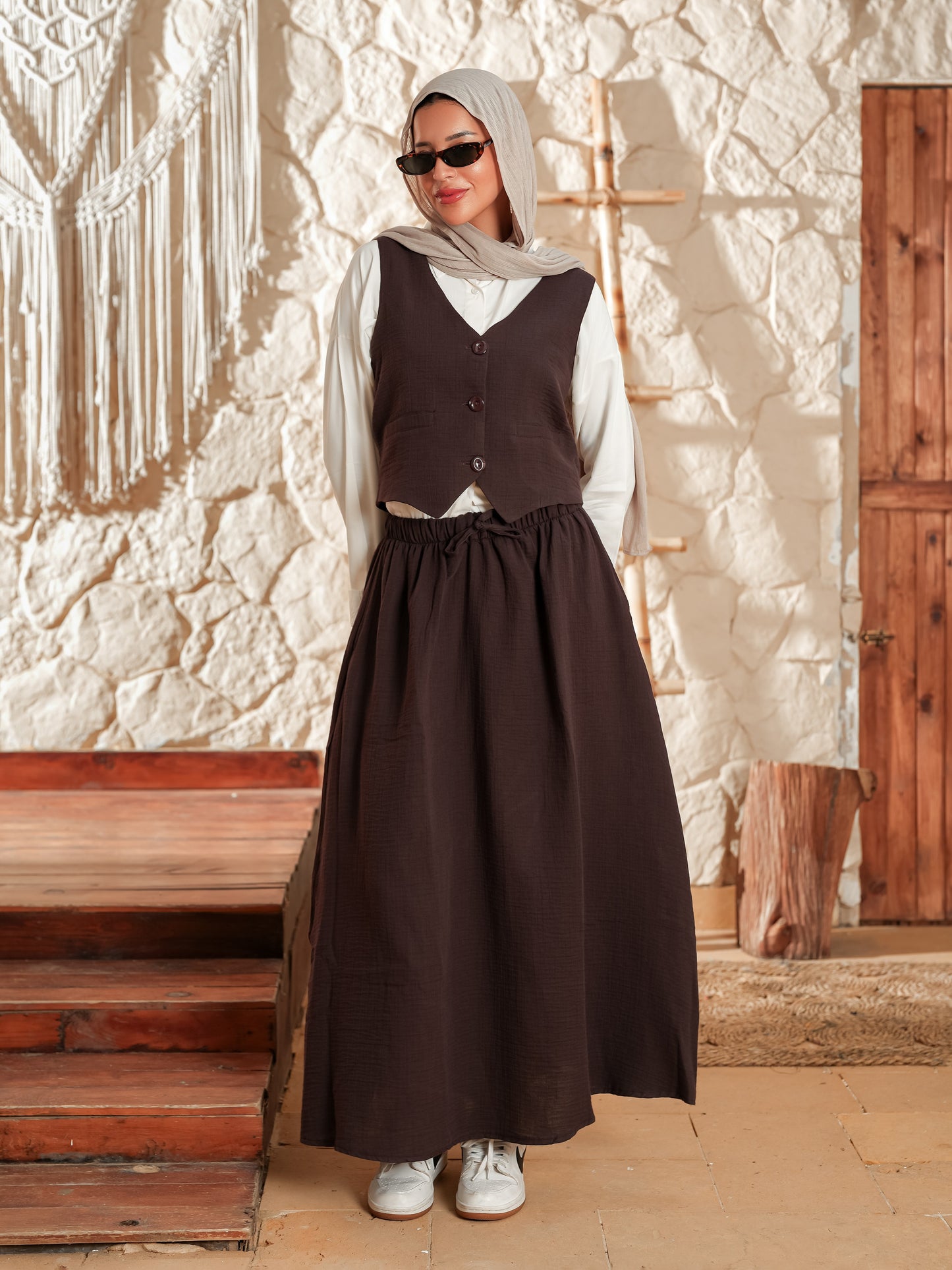 Brown sleeveless suit skirt set