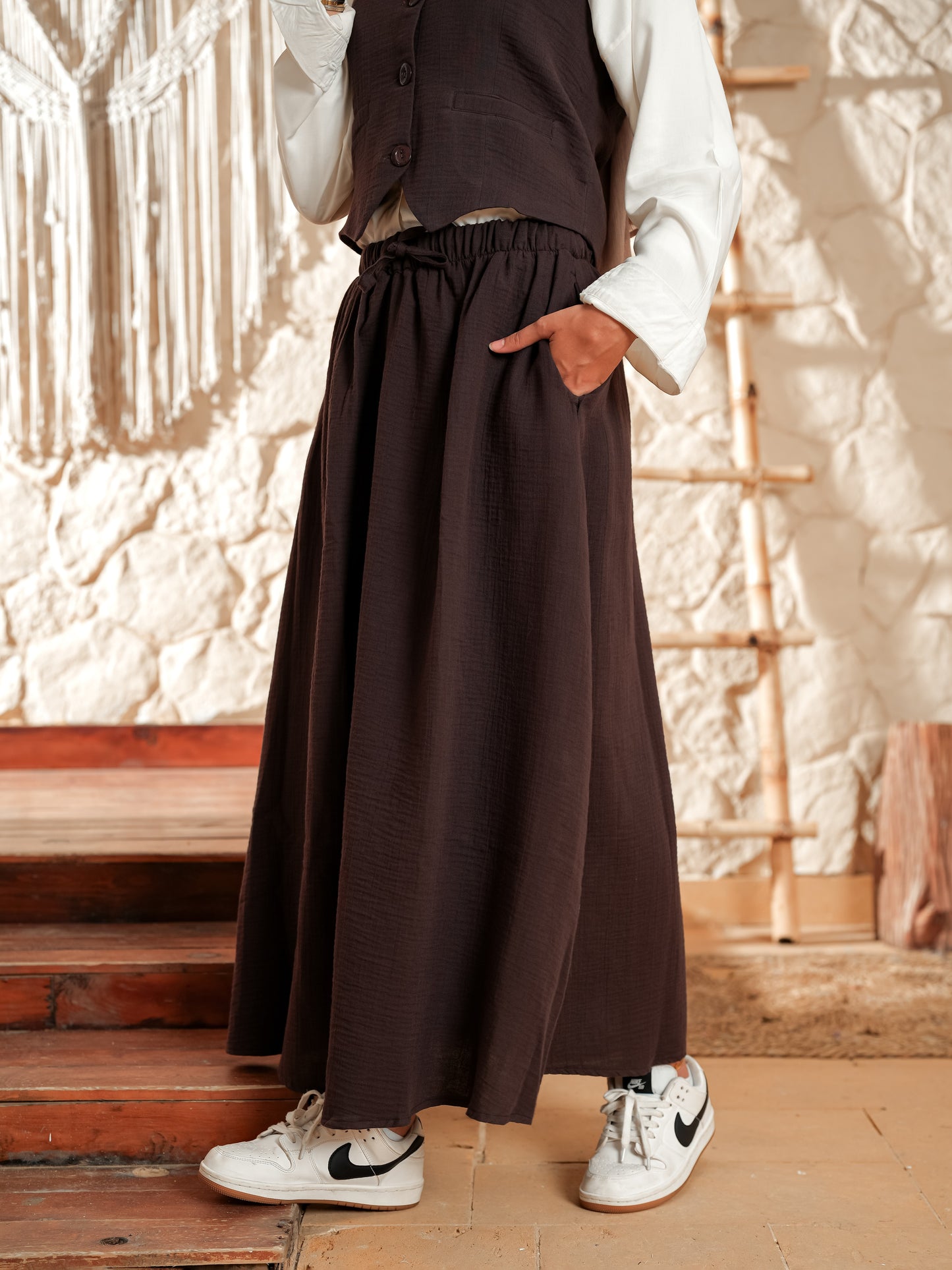 Brown sleeveless suit skirt set
