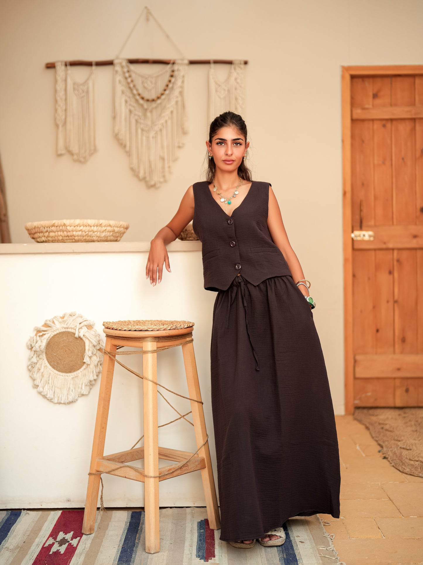 Brown sleeveless suit skirt set