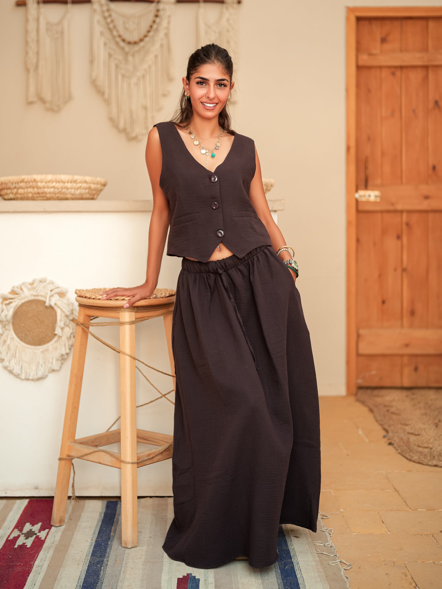 Brown sleeveless suit skirt set